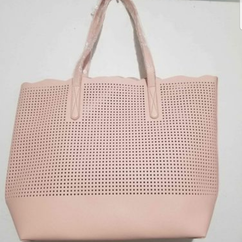NEW Neiman marcus laser cut tote Dimensions: 16.5" x 12" x 6" Straps: 8.5"